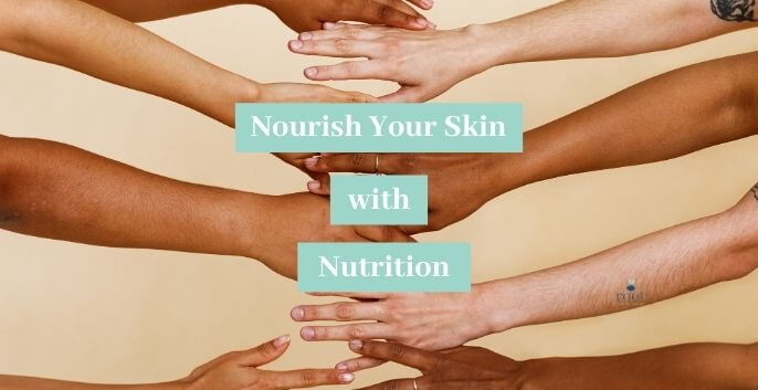 Arms of different races outstretched touching together | Skin Hydration Vitamins | Root Nutrition Education & Counseling