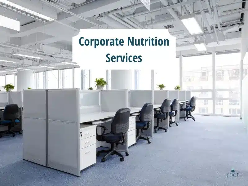 A workplace cubicle empty with the words reading "Corporate Nutrition Services." | Root Nutrition & Education